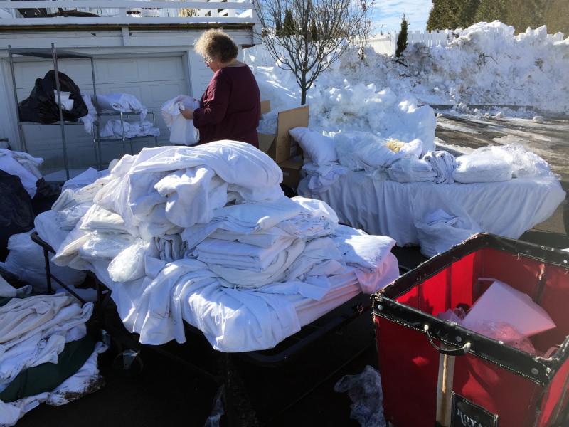 Truckloads of linens went to new owners all over the peninsula. SUZI THAYER/Boothbay Register