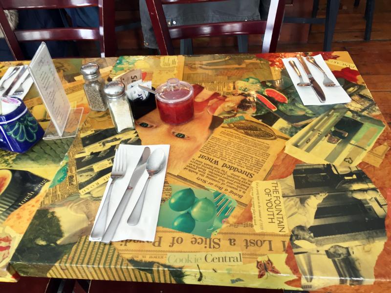 A decoupaged table at Crissy’s Breakfast & Coffee Bar. SUZI THAYER/Boothbay Register