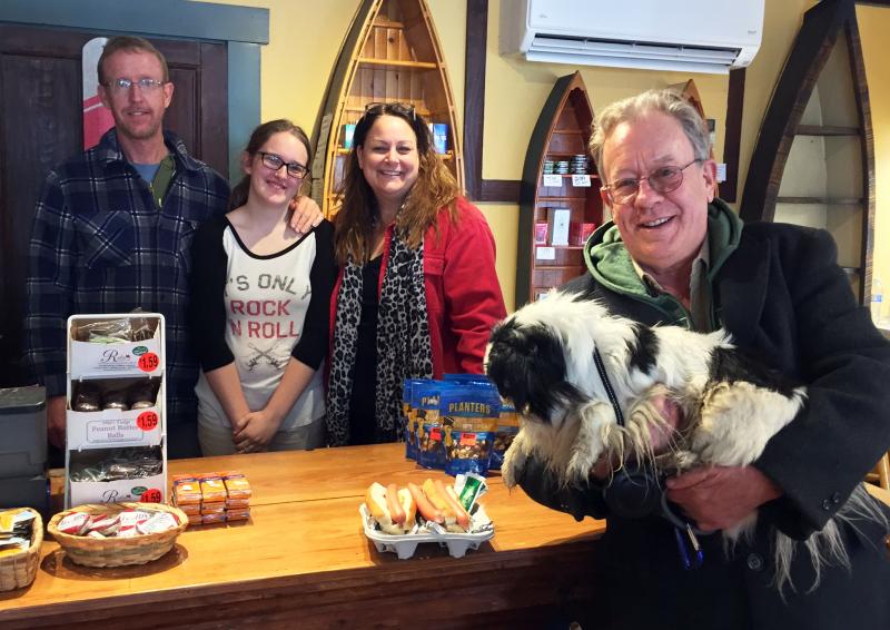 Tony Heyl and Hoover are regular customers of the market. SUZI THAYER/Boothbay Register