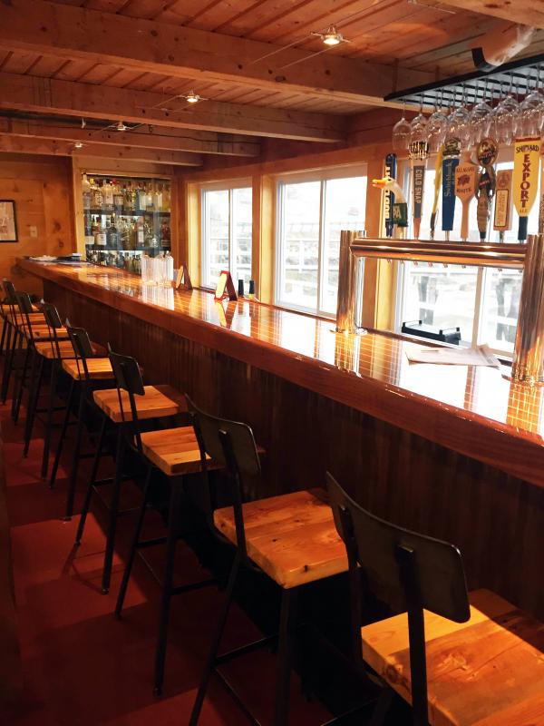 The new bar at Robinson’s, an exact replica of the old one, has a water view from every seat. Courtesy of Kellie Slater