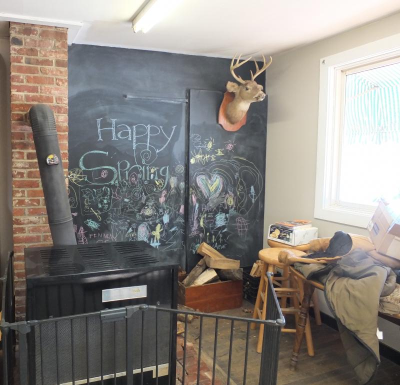 The wood stove will soon be removed here in the performance/kid space at The Alna General Store. LISA KRISTOFF/Boothbay Register The Alna General Store