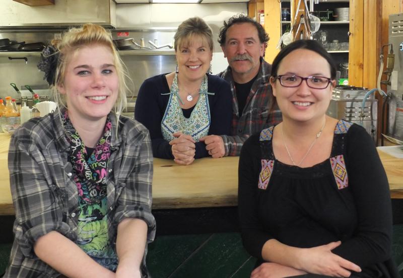 The Alna General Store’s new owners Jane and Ken Solorzano, in the background, and employees Darci Day, left, and Dahlia Solorzano. LISA KRISTOFF/Boothbay Register