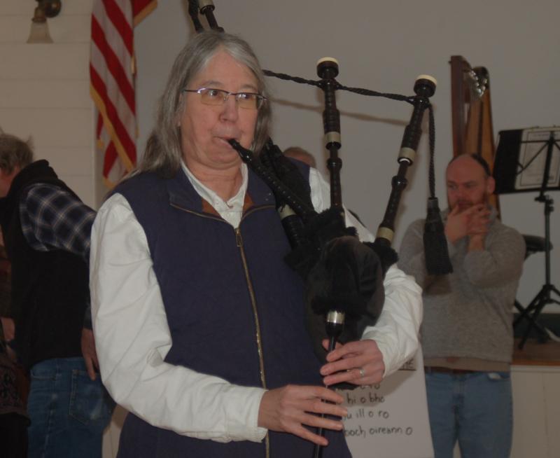 Sue Mack plays the bagpipes. ART MAYERS/Boothbay Register