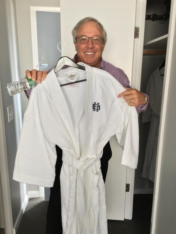 Paul Coulombe shows off one of the luxurious bathrobes that are provided in the rooms at the Boothbay Harbor Oceanside Golf Resort. SUZI THAYER/Boothbay Register