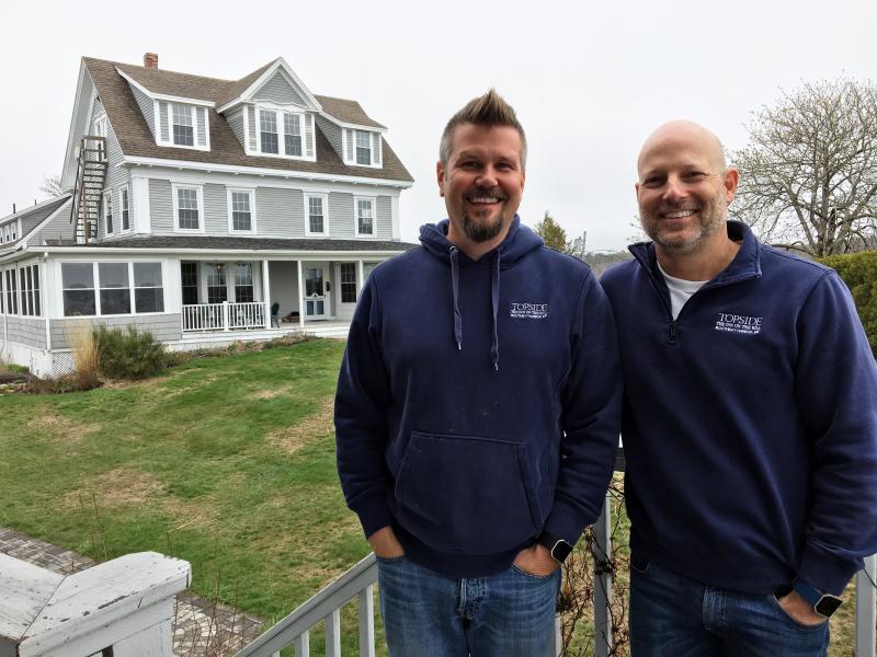 Buzz Makarewicz, left, and Mark Osborn in front of their Boothbay Harbor business, Topside Inn. SUZI THAYER/Boothbay Register