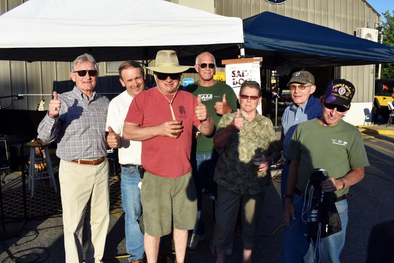 A group of people who have attended all 11 Jeep Nights, with Newcastle CDJRV owner Randy Miller on the left. Courtesy of Fred McClelland