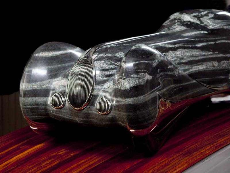 Andreas von Huene’s “Drive,” a quartzite Jaguar with working headlights. Courtesy of Dennis Griggs Andreas von Huene’s “Drive”