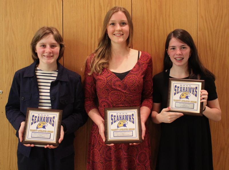 Women’s track team award winners, from left, Elisabeth Wright, Coaches Award, Loren Genrich, MVP, and Reagan Cola, Most Improved. SUE MELLO/Boothbay Register.