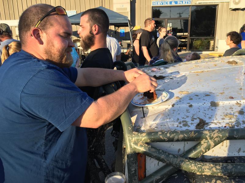 Dinner from the hood of the dirtiest Jeep at the 11th annual Jeep NIght at Newcastle CDJRV on June 14. SUZI THAYER/Boothbay Register