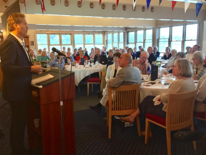 Jonathan White speaks about his book, “TIDES: The Science and Spirit of the Ocean,” at the Boothbay Harbor Yacht Club on June 23. SUZI THAYER/Boothbay Register