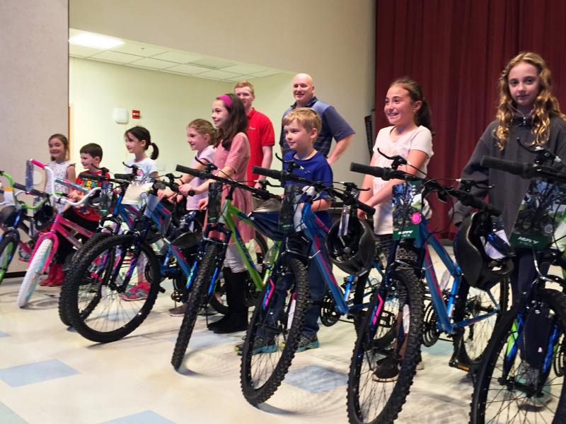 2017 Bikes for Books winners at Edgecomb Eddy School are, from left: Charlotte Abello, Ethan Clark, Morganne Phelps, Abbie Clark, Aliyah Bowley, Takoda Dionne, Hannah Abello and Anna Gosselin. Not pictured are fellow winners Silas Lehouillier, Emily Gosselin and Lydia Currier. SUZI THAYER/Boothbay Register