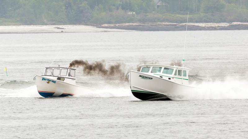 Cameron Crawford, in Wild Wild West, left, won the race for the fastest lobster boat of the day, and Tom Clemons, in Motivation, place second, in the Charlie Begin Memorial Lobster Boat Race on June 17. Courtesy of Michael Leonard