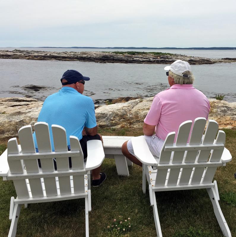 Bill Adair, left, and Paul Coulombe enjoy the serenity at the Cockolds on July 29. SUZI HAYER/Boothbay Register