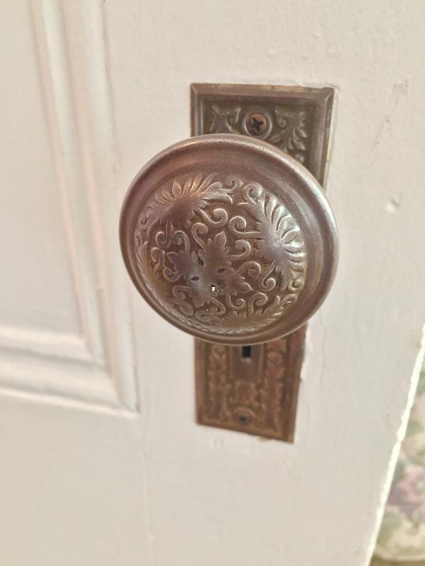 A doorknob was scraped of layers of paint to reveal the beauty lying beneath. SUZI THAYER/Boothbay Register