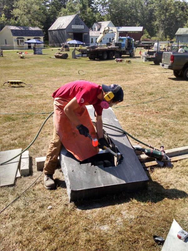 Intern Sam Betts is working on his own challenging project. Margaret Hoffman photo Maine Coast Stone Symposium