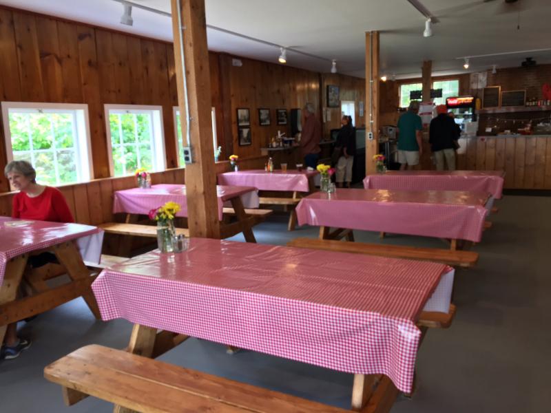 The dining room at Joe Lane Lobsterman features six red and white checked plastic table clothes. SUZI THAYER/Boothbay Register