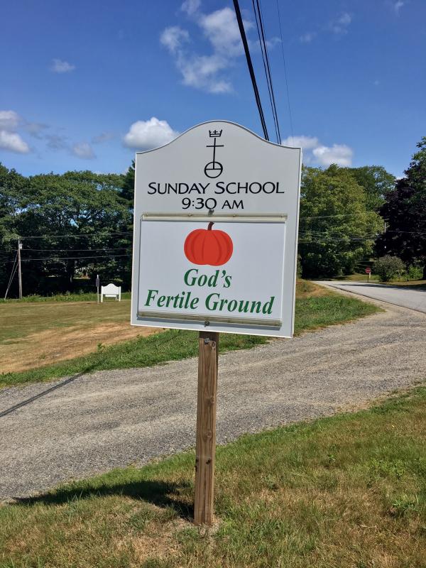 The “God’s Fertile Ground” sign at Edgecomb Community Church on Cross Point Road. SUZI THAYER/Boothbay Register