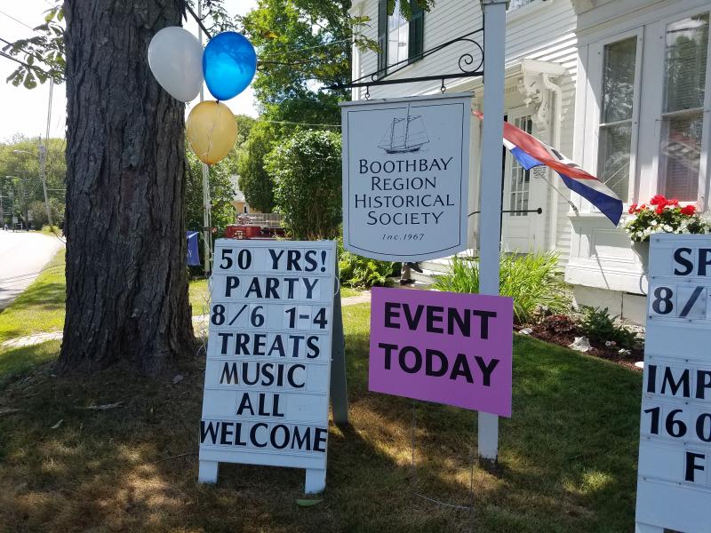 Signs in front of the Historical Society welcome visitors. KATRINA RICKERMANN/Boothbay Register