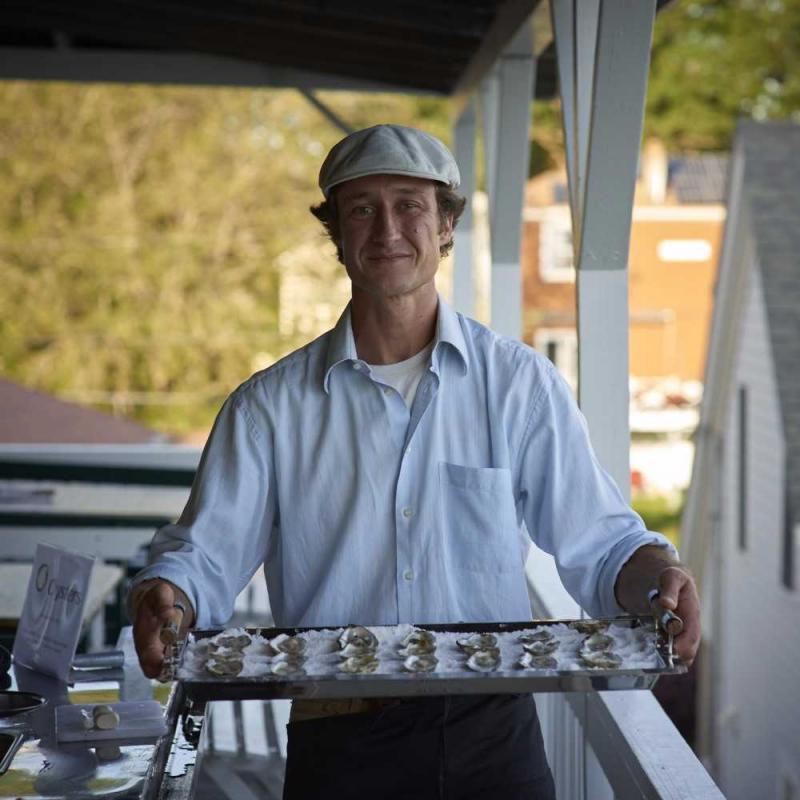 Lucas Myers and his mobile shucking station bring O’Oysters to the Village during the Wiscasset Art Walk. Courtesy of Lucia Droby