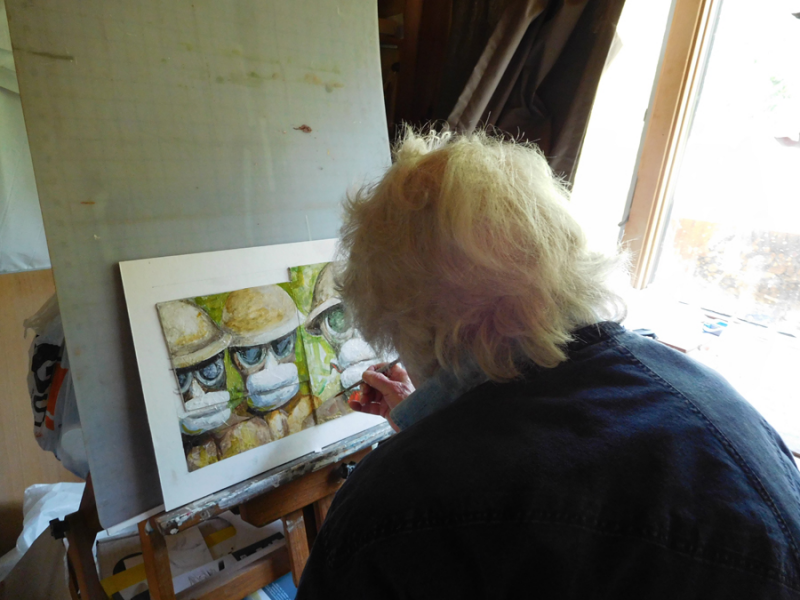 Brenda Bettinson working on “Gas Moisten the Pads,” a 27” x 21” acrylic painting on board. Courtesy of Mathias Fine Art Brenda Bettinson