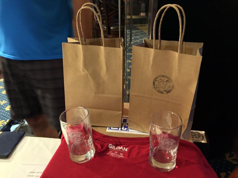 Glasses from Cold River Distillers were being sold for people to take from place to place to get refills of cocktails. SUZI THAYER/Boothbay Register
