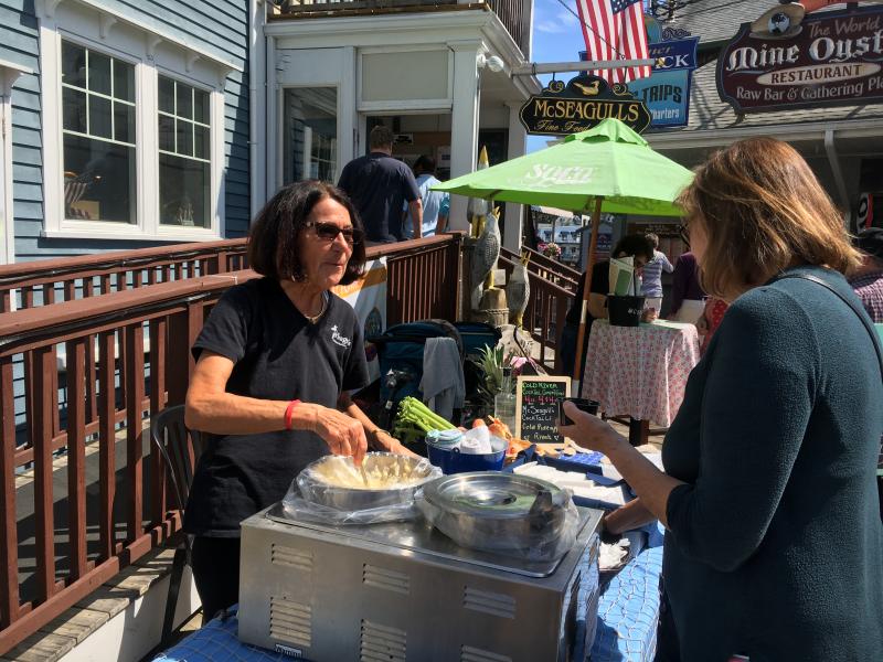 Laura Francis served up a delectable seafood chowder at McSeagulls on Pier One. SUE MELLO/Boothbay Register