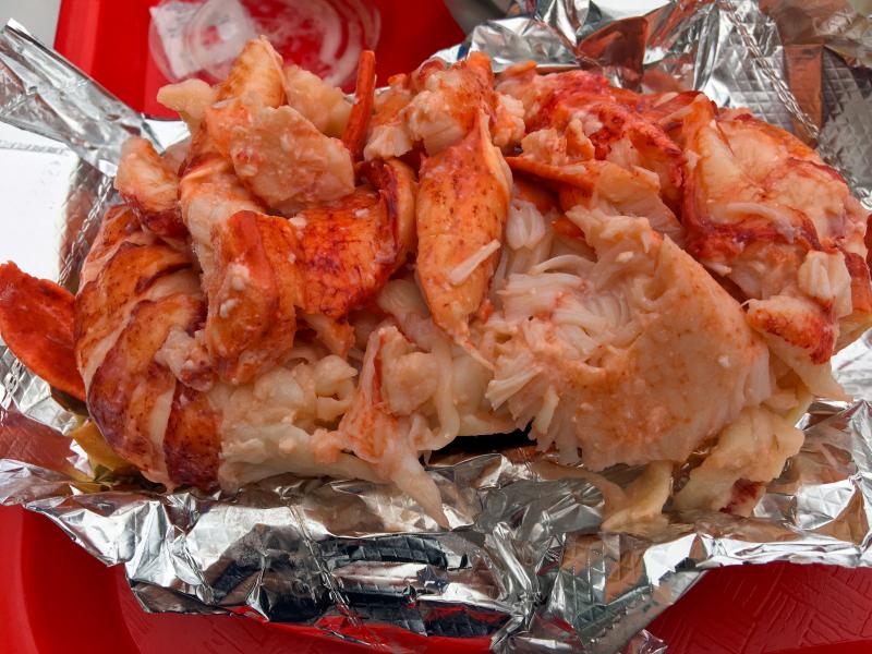 Red’s Eats lobster rolls literally overflow with lobster. SUZI THAYER/Boothbay Register