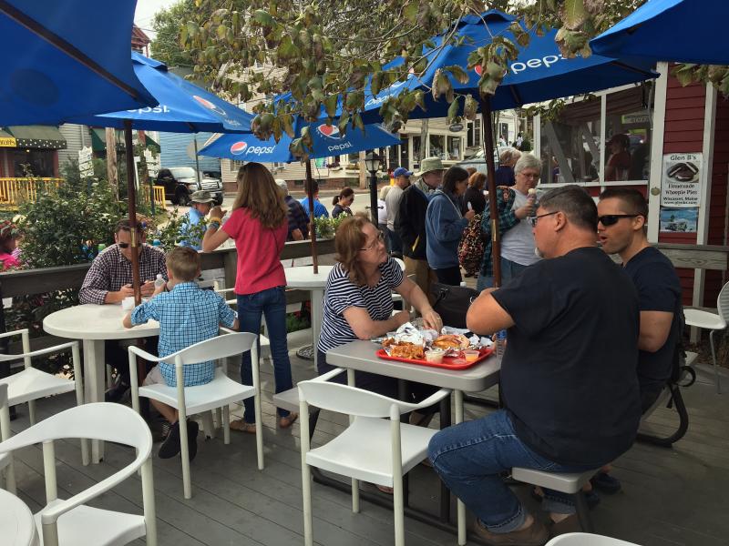 Diners on one of Red’s Eats’ decks. SUZI THAYER/Boothbay Register
