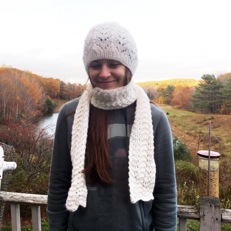Emily Stanley models a hat and a scarf made with Growing Rabbit Tree spun yarn. Courtesy of Robin Ford