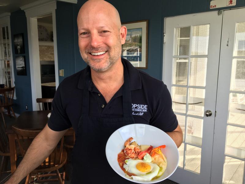 Mark Osborn shows off one of his gourmet savory breakfasts on Oct. 22. SUZI THAYER/Boothbay Register