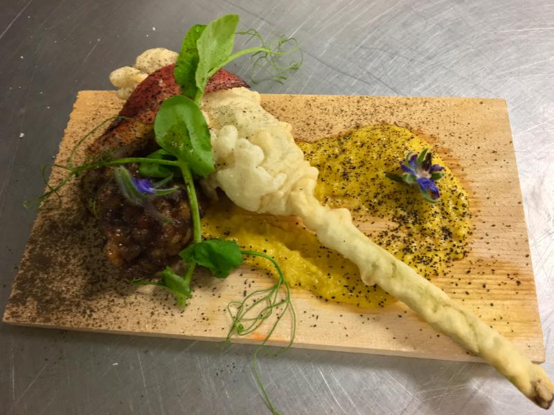 Stephen Richards wowed the people with this smoked lobster mascarpone stuffed tempura zucchini blossom. Courtesy of Michelle Amero