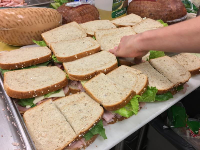 Over 500 ham and cheese sandwiches were given away Nov. 2. SUZI THAYER/Boothbay Register