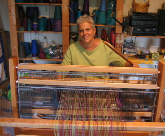 Jill Butke at her weaving loom. Courtesy of Jill Butke