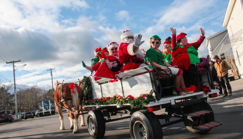 Santa and Mrs. Claus and their North Pole entourage take the first horse and wagon ride around town. DIANE DORBIN/Boothbay Register