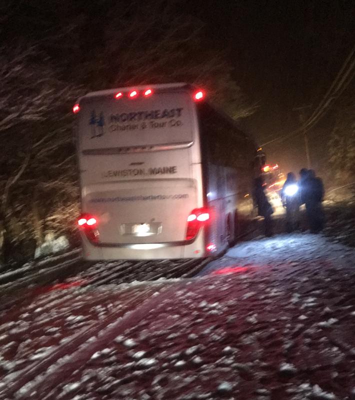 A Northeast Charter & Tour Co. bus from Lewiston, with 33 passengers on board, was heading south toward Route 1 when it swerved to avoid a car that had slid off the road. SUZI THAYER/Boothbay Register