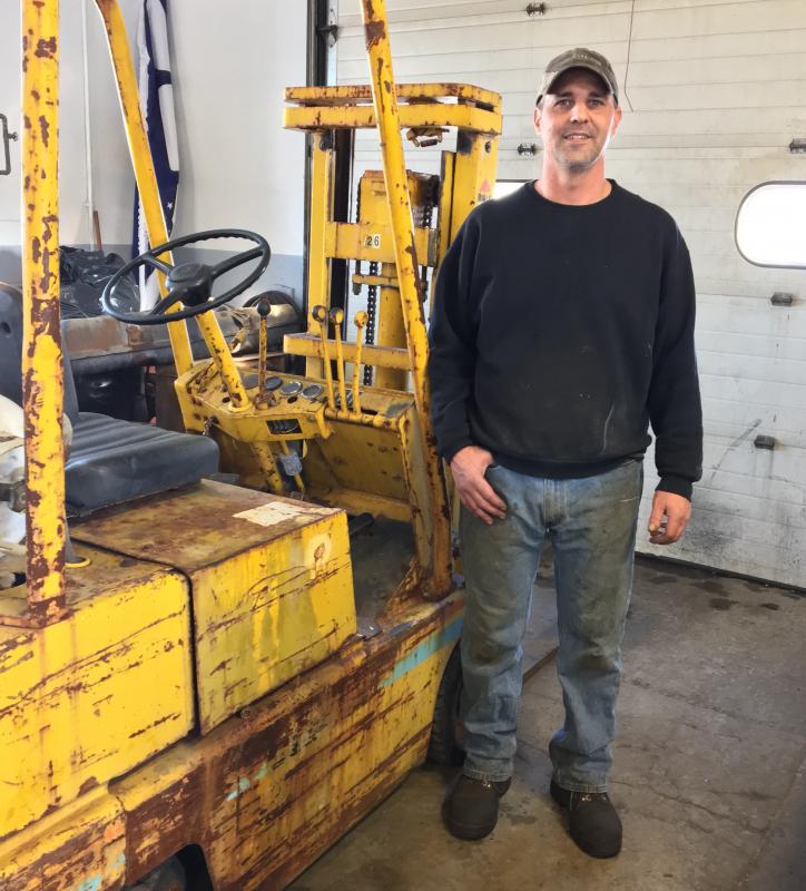 Larry Eckert in his new shop in Wiscasset, FIX Marine, Truck and Automotive. SUZI THAYER/Boothbay Register