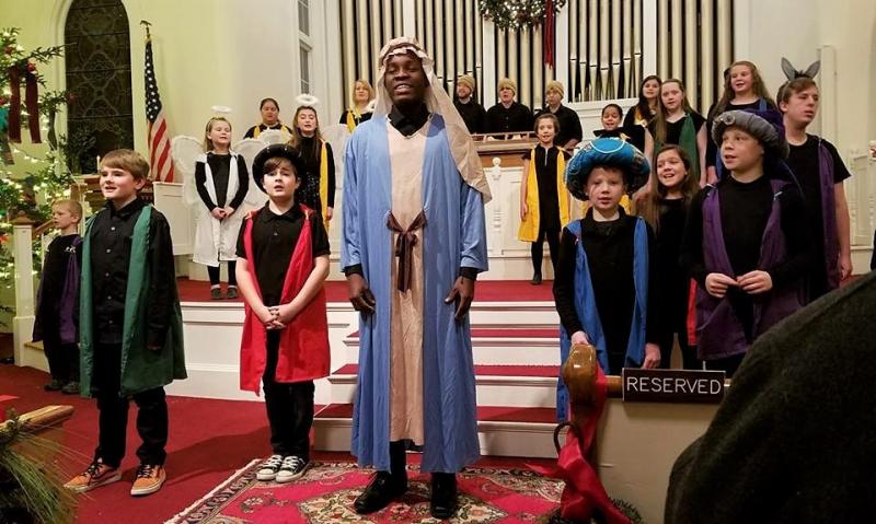 Richardsky Adoux, “Joseph,” leads the cast in singing “The King of Kings” in the Y-Arts production of “Three Wee Kings” on Dec. 16 at the Congregational Church of Boothbay Harbor. Courtesy of Emily Mirabile