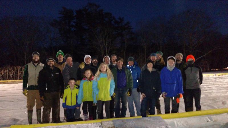 About 20 volunteers helped get the rink ready on Dec. 27. Courtesy of Mame Anthony