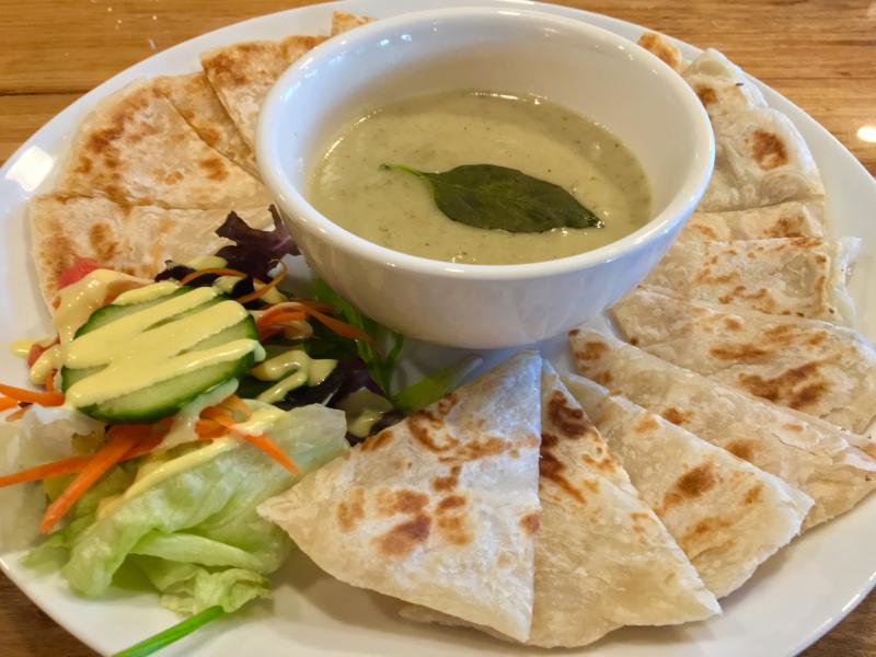 Roti is another popular appetizer at O-Cha: Pan-fried Indian flatbread with a green curry dipping sauce. SUZI THAYER/Boothbay Register