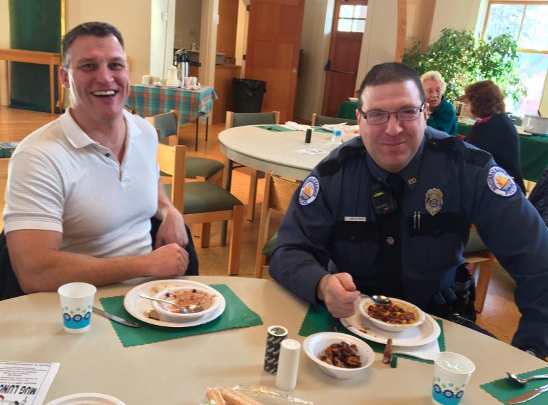 Boothbay Harbor Police Chief Bob Hasch does lunch with Officer Tom Chryplewicz at St. Columba’s Episcopal Church on Jan. 18. SUZI THAYER/Boothbay Register