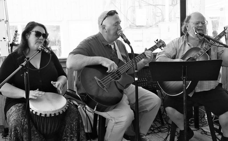 Chris and Dave Gagne and Dan Grish performing at McSeagull’s. Courtesy of Chris Gagne