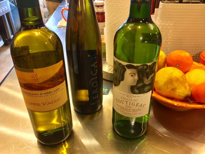 Kim gave us a choice of three wines to use in the fondue. And drink. SUZI THAYER/Boothbay Register
