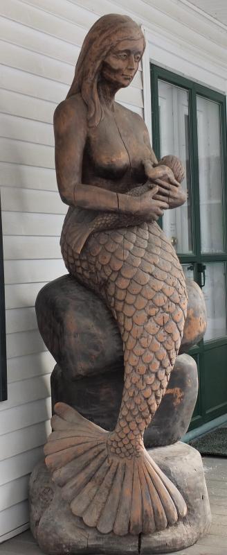 Bill Royall’s 1993 white pine sculpture, “Mermaid and Child,” exhibited for the first time in decades at Studio 53 in Boothbay Harbor. Southport ME sculptor William Royall