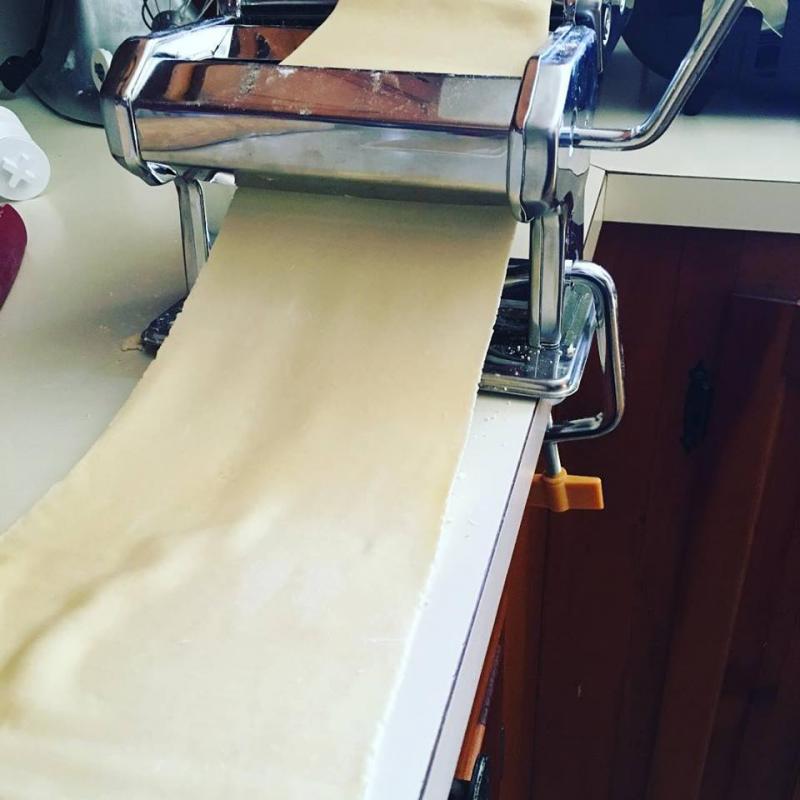 A sheet of Jessica Deshiro’s pasta comes off the press. Courtesy of Jessica Deshiro