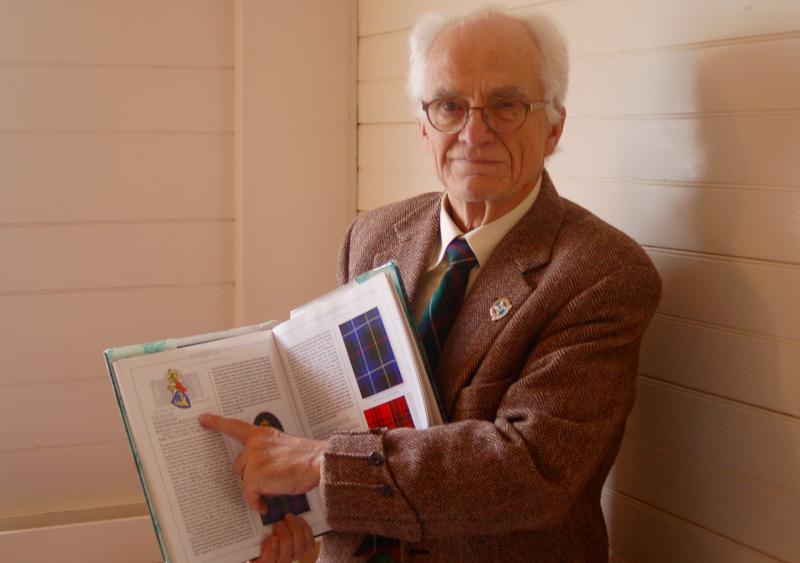 Bill McKean of Whitefield tells the history of the tartan. ART MAYERS/Boothbay Register
