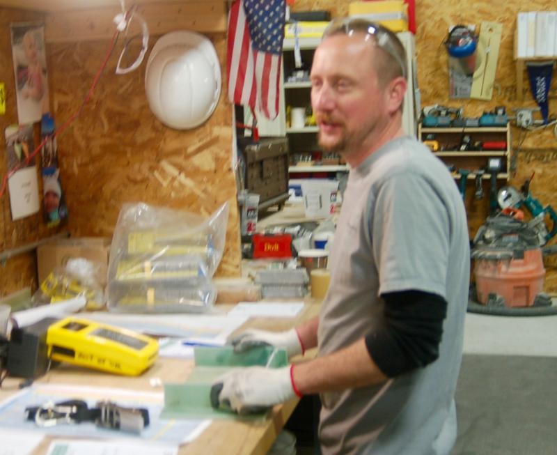 Jason Jarvis works on a battery tray. ART MAYERS/Boothbay Register