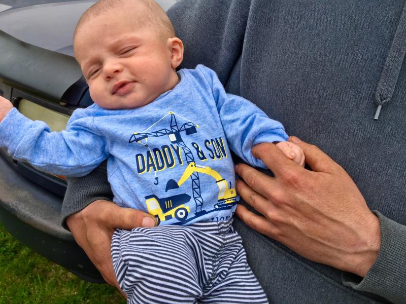 Todd Hyson and Tory Paxson’s 2-month-old son Aiden, in his favorite shirt. SUZI THAYER/Boothbay Register