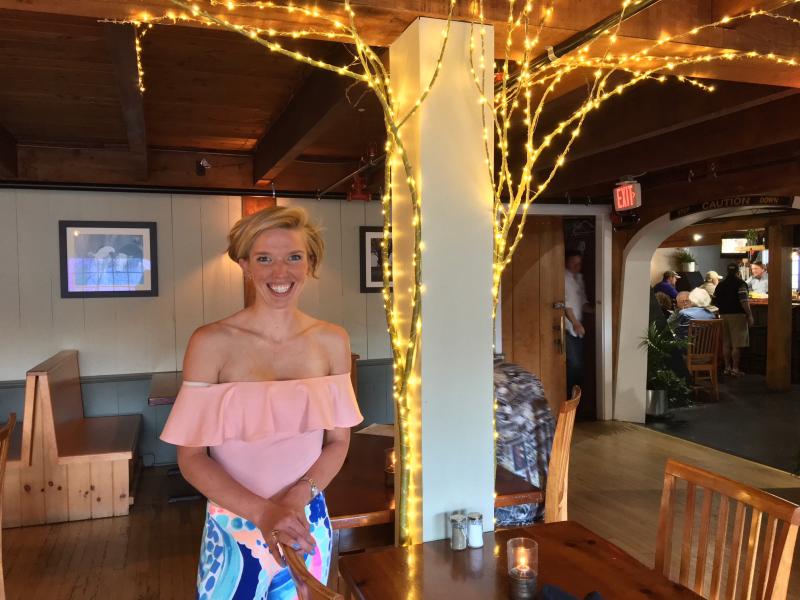 Bailey Bartlett at Montsweag Farms Restaurant next to one of her artful creations. SUZI THAYER/Boothbay Register