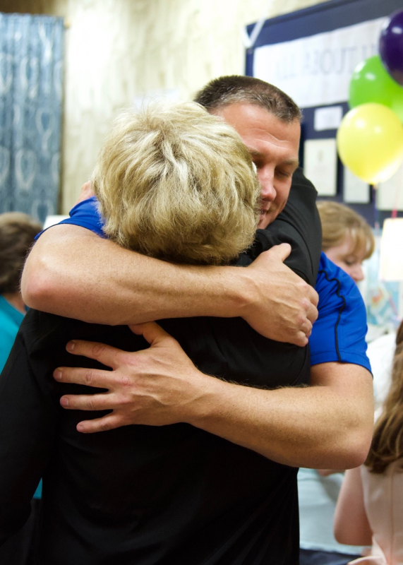 Boothbay Harbor Police Chief Robert Hasch hugs Jane Good at her surprise “Thank You “ party on Saturday, May 26. Courtesy of Bob Crink