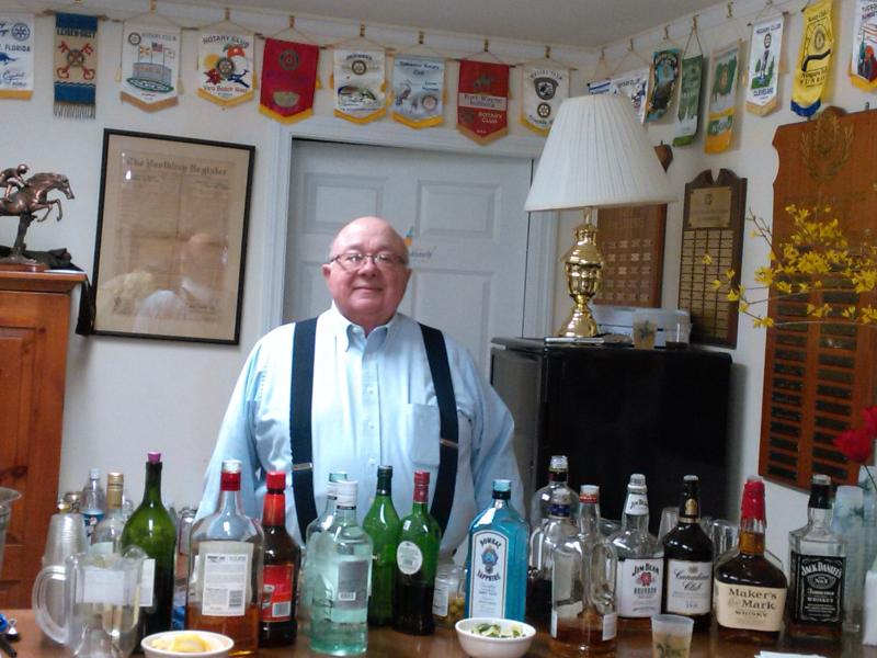 Jim Stormont mans the Rotary clubhouse bar at the 2018 Kentucky Derby party. JANE CARPENTER/Boothbay Register